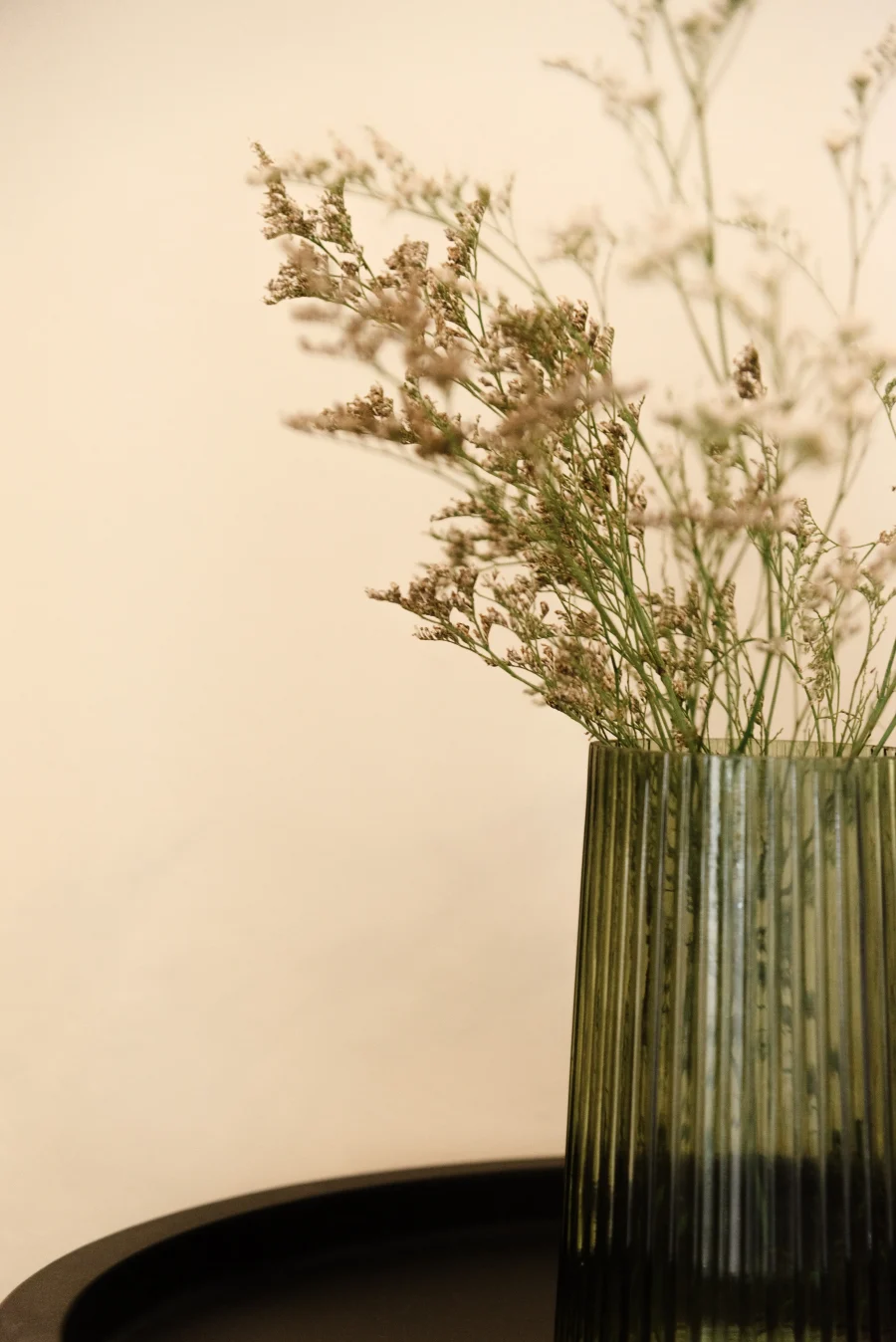 Interior design detail from a renovated studio at Kamini Apartments Corfu, showcasing contemporary decorative touches and clean, neutral aesthetics.